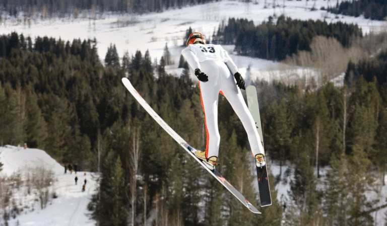 Le rôle du timing dans le saut à ski : comment le vent affecte la portée